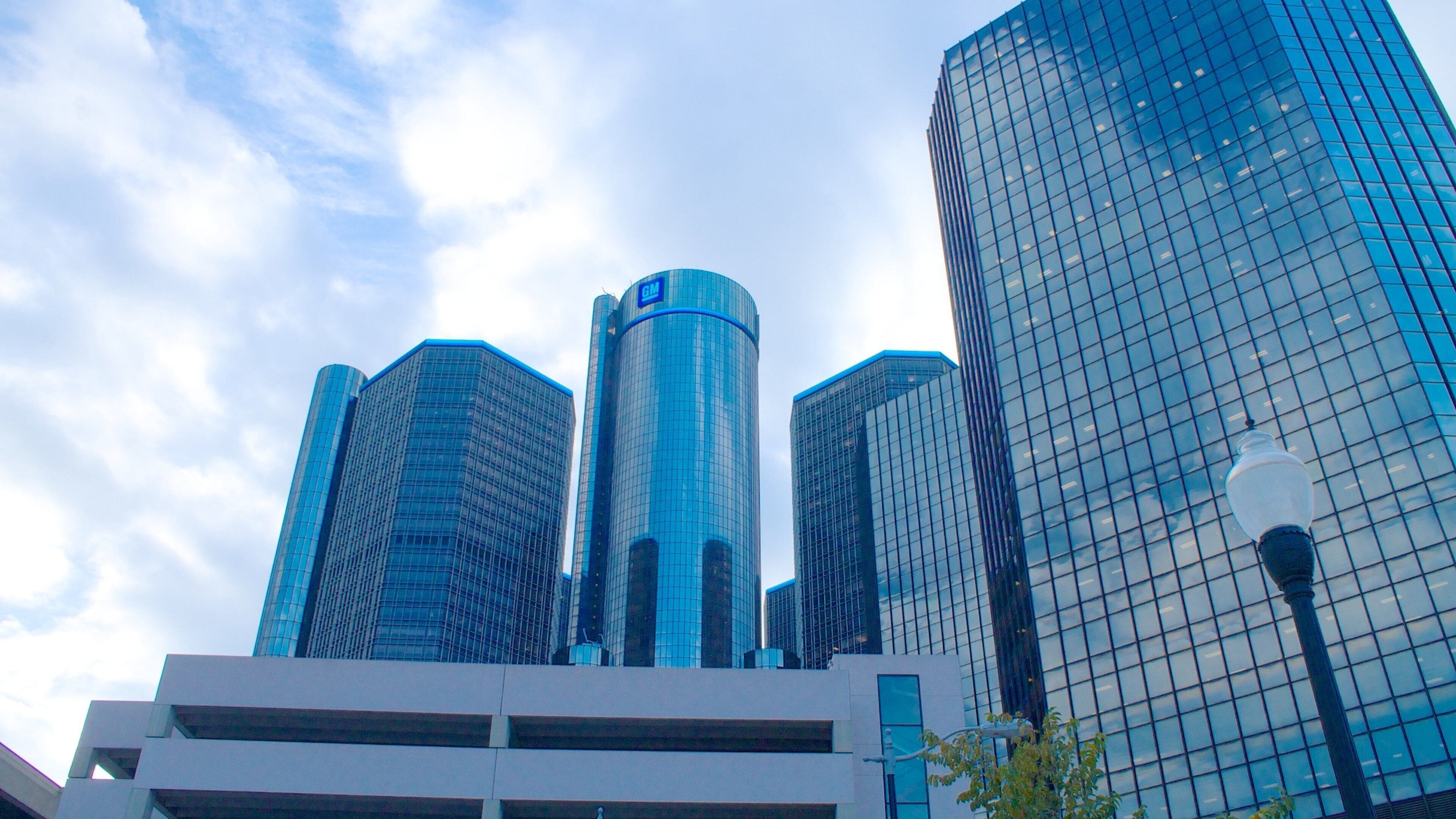 A cityscape with modern skyscrapers and a clear sky.