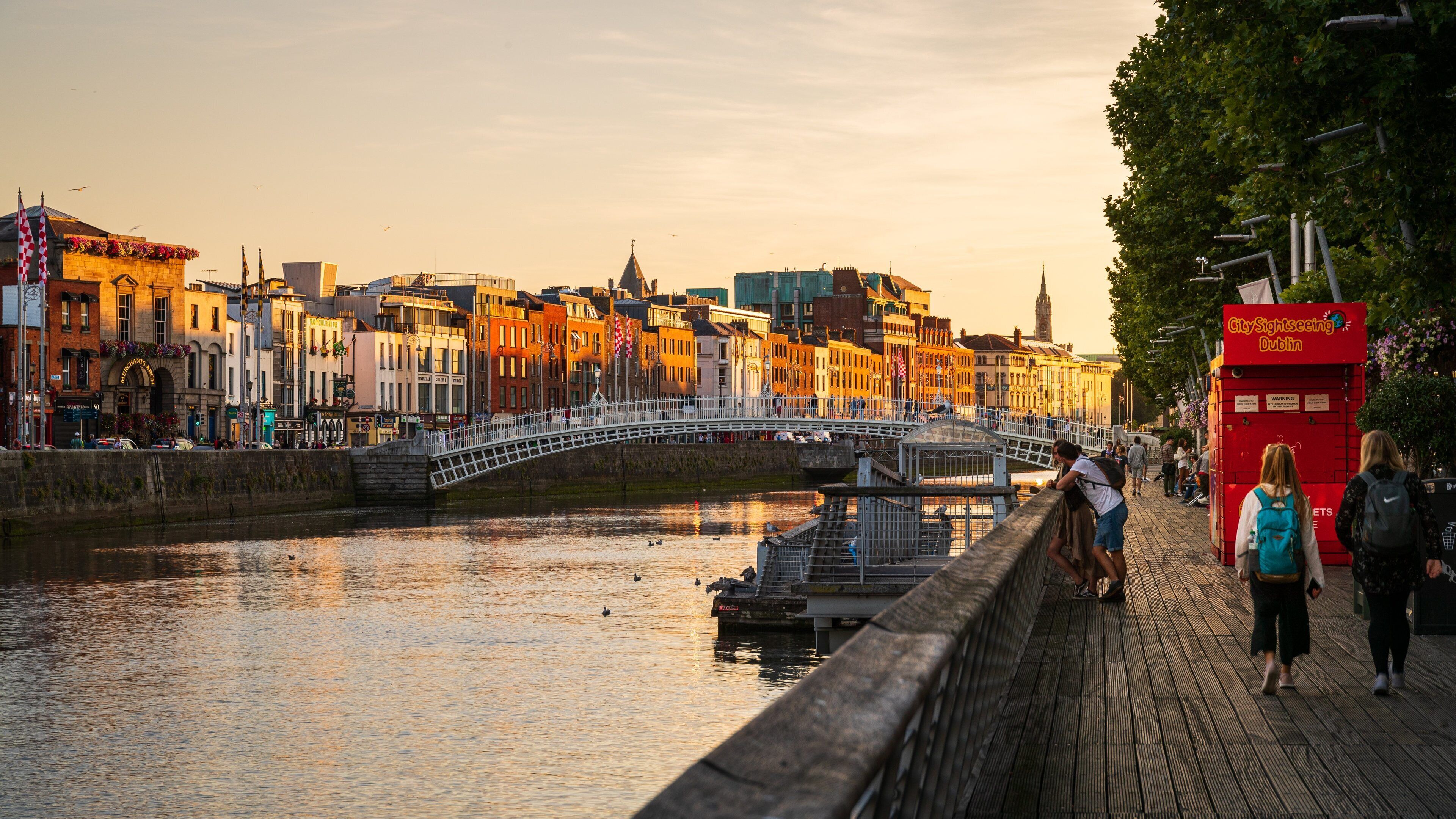 Dublin featuring a river or creek, a sunset and a bridge