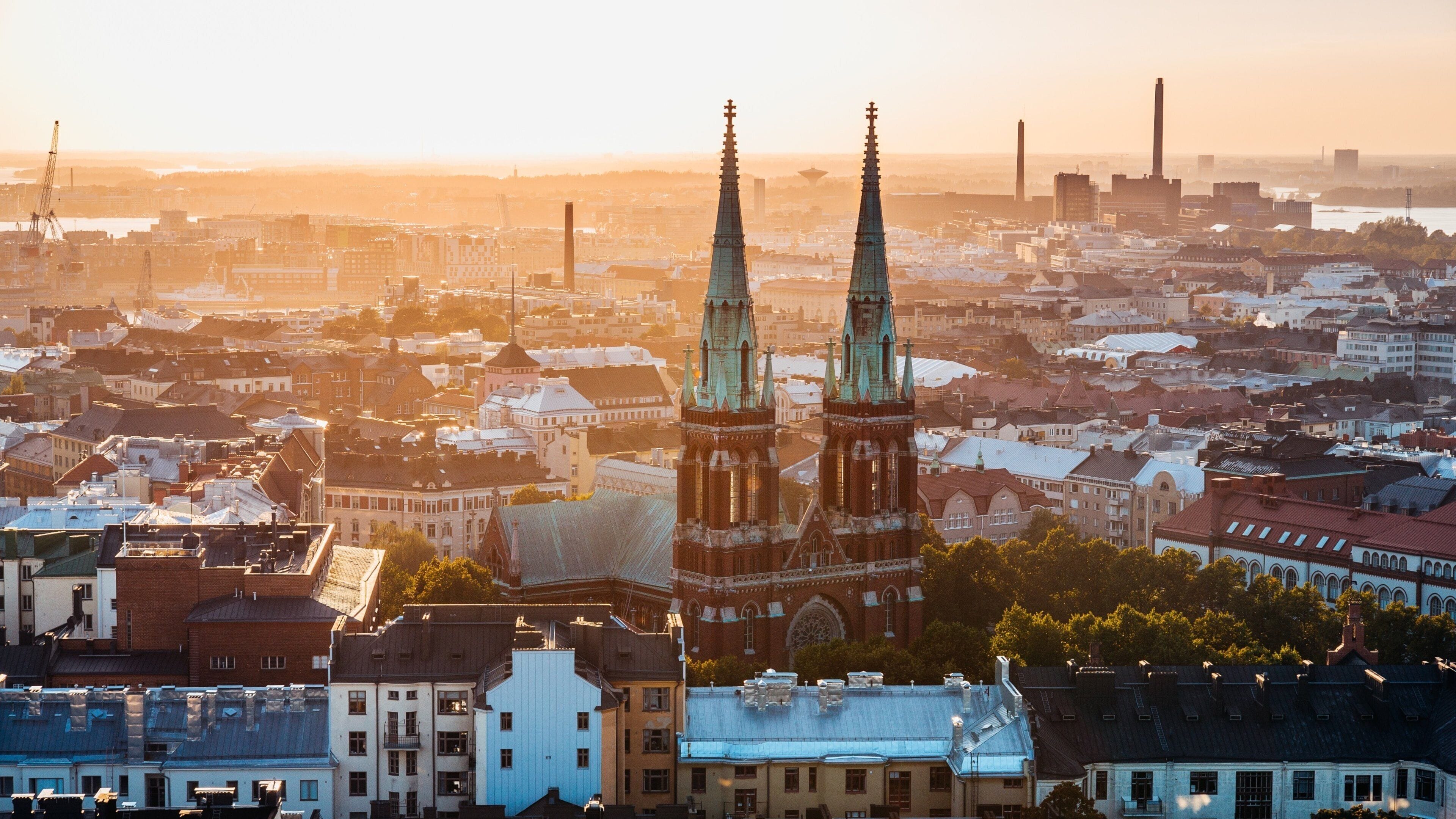 Helsinki featuring a city and a sunset