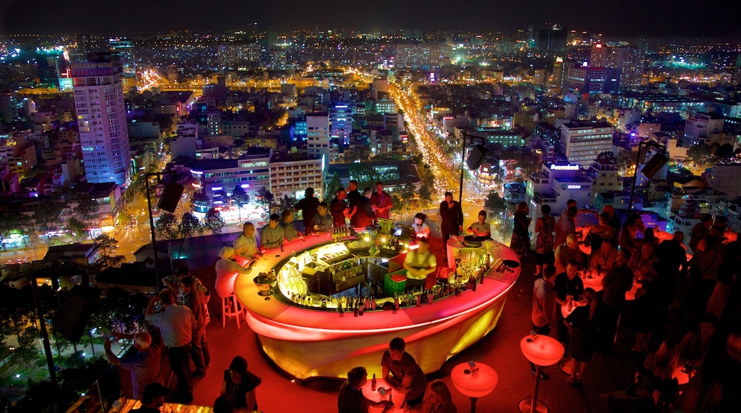 Ho Chi Minh City showing night scenes, a bar and a city