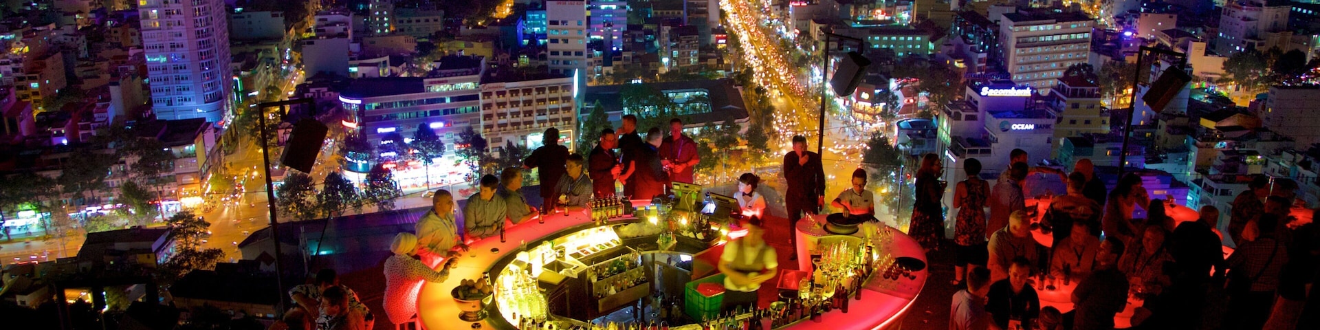 Ho Chi Minh City showing night scenes, a bar and a city