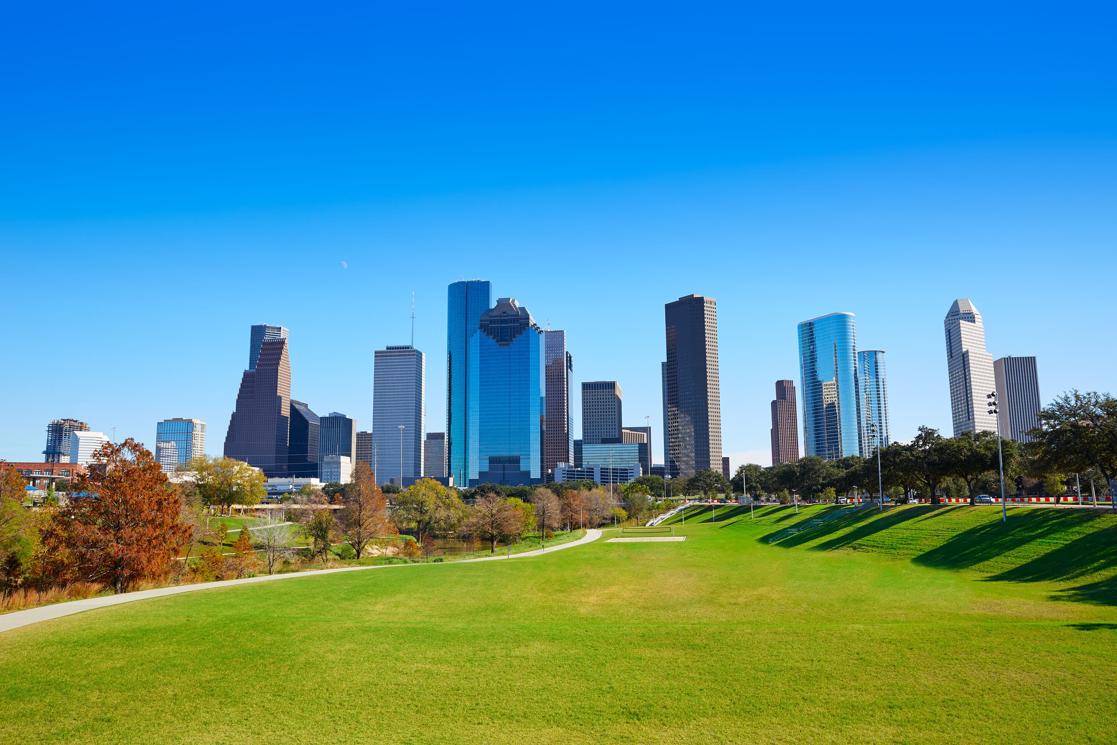 Houston skyline in sunny day from park grass of Texas USA