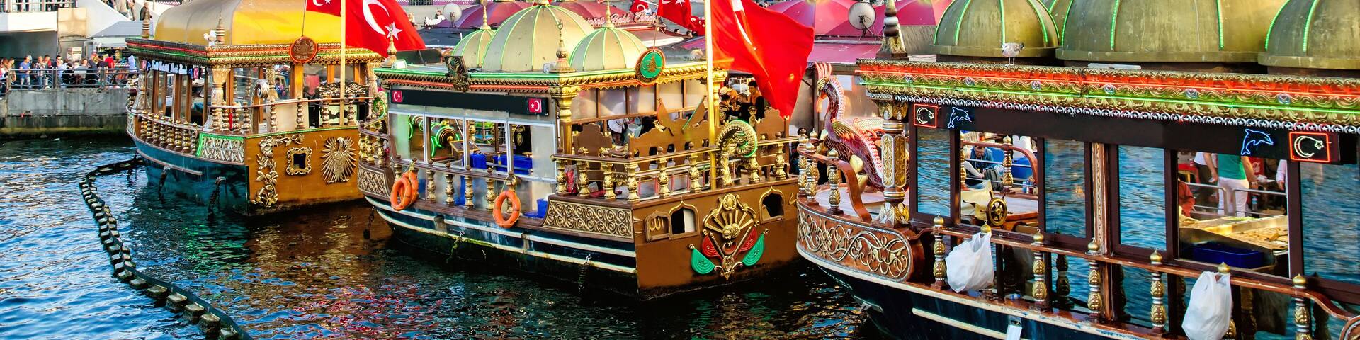 ISTANBUL, TURKEY - October 6, 2015: View of the Suleymaniye Mosque and fishing boats in Eminonu, Istanbul, Turkey