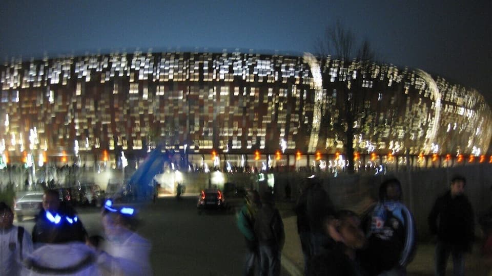World Cup stadium, Soccer City, A little blurry but an awesome sports venue and amazingly artful structure from the outside.