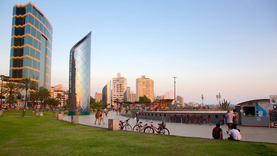 Lima featuring a high rise building and street scenes