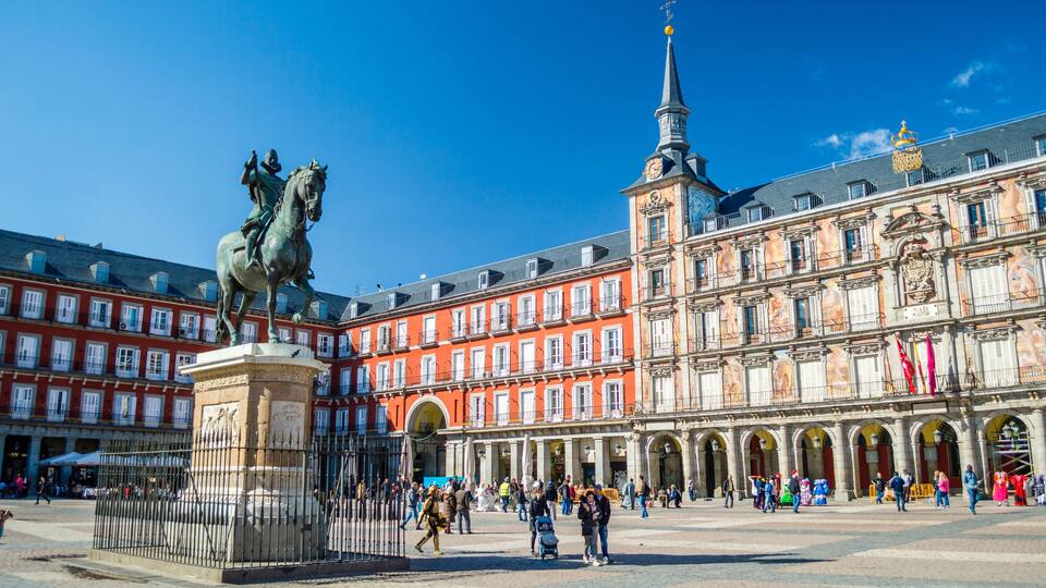 MADRID, SPAIN - March 03, 2016: Felipe III statue and Casa de la Panaderia on Plaza Mayor in Madrid, Spain