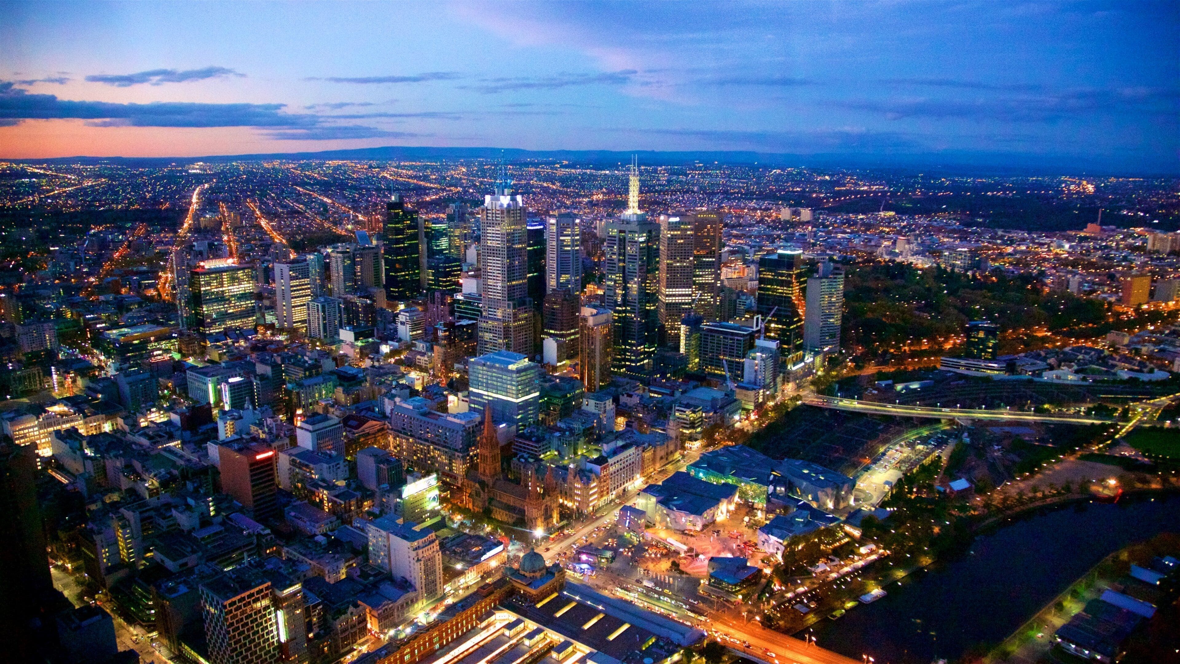 Melbourne showing a city, a sunset and landscape views