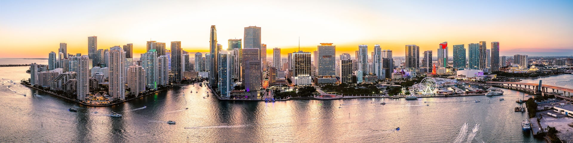 Aerial panorama of Miami, Florida at dusk. Miami is a majority-minority city and a major center and leader in finance, commerce, culture, arts, and international trade.