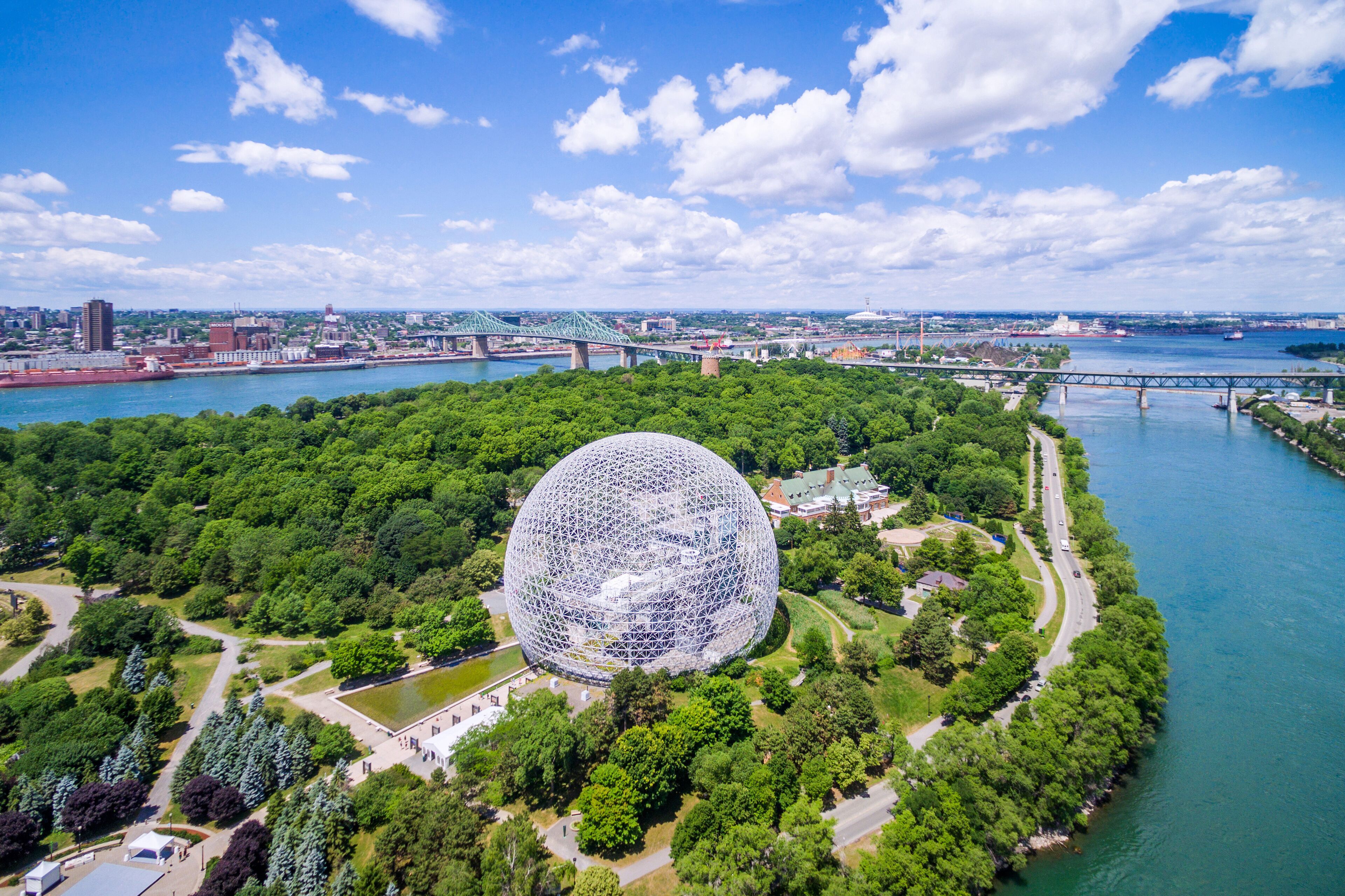 Montreal, Canada - July 3, 2016: Aerial view of Montreal cityscape including the Biosphere geodesic dome and Jacques Cartier bridge in Montreal, Quebec, Canada.