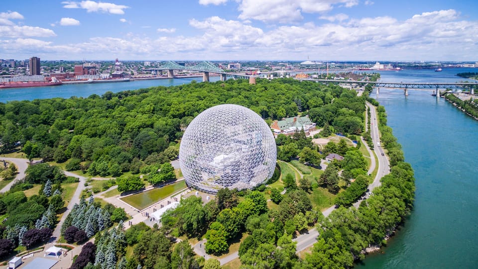 Montreal, Canada - July 3, 2016: Aerial view of Montreal cityscape including the Biosphere geodesic dome and Jacques Cartier bridge in Montreal, Quebec, Canada.