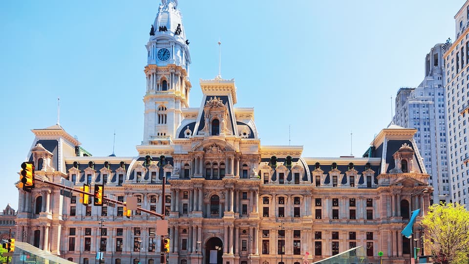 A historic building with ornate architecture and a clock tower.