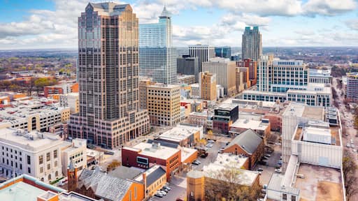 Aerial view of Raleigh, North Carolina skyline on a sunny day.