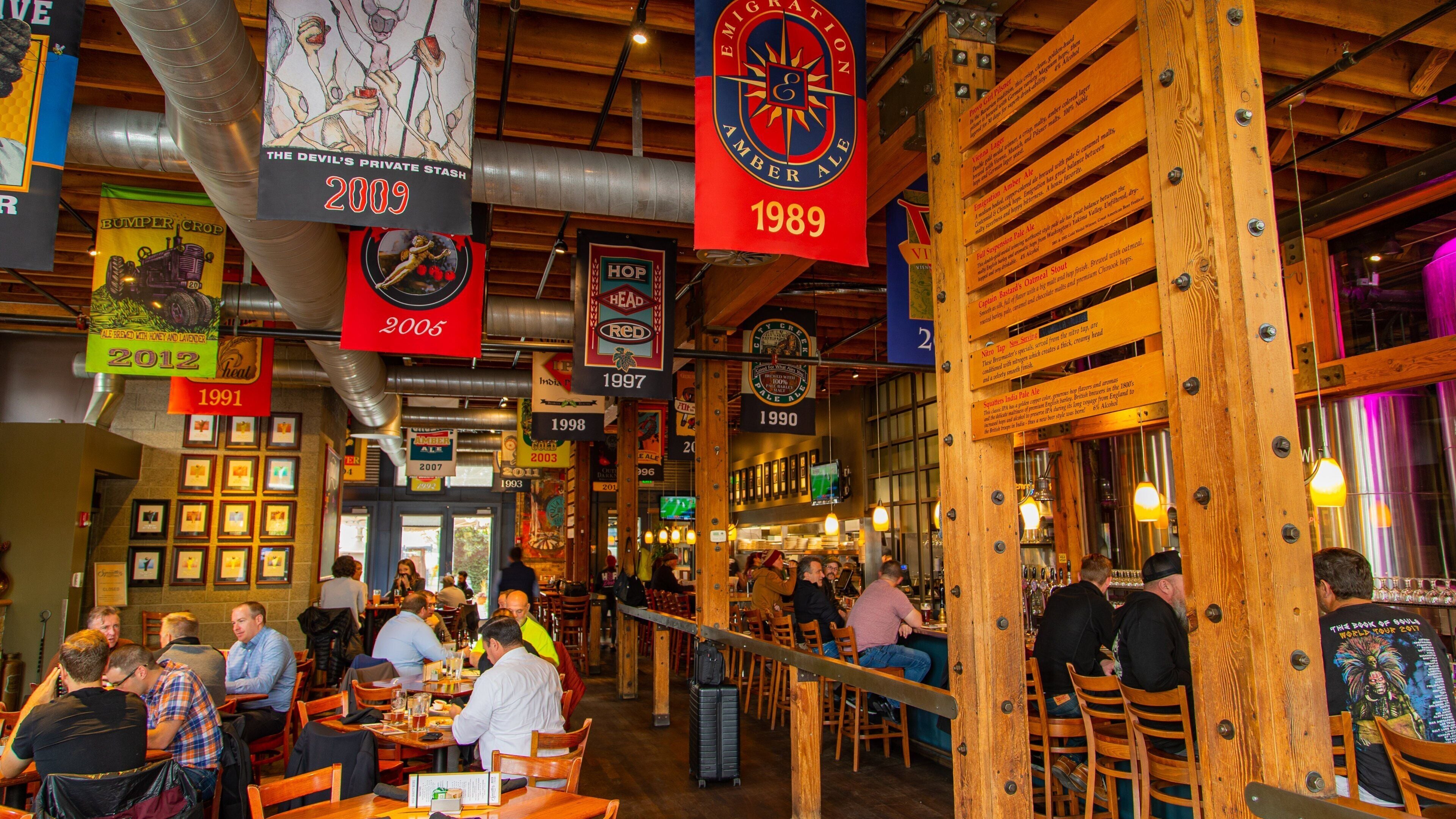 Salt Lake City showing interior views and a bar as well as a large group of people