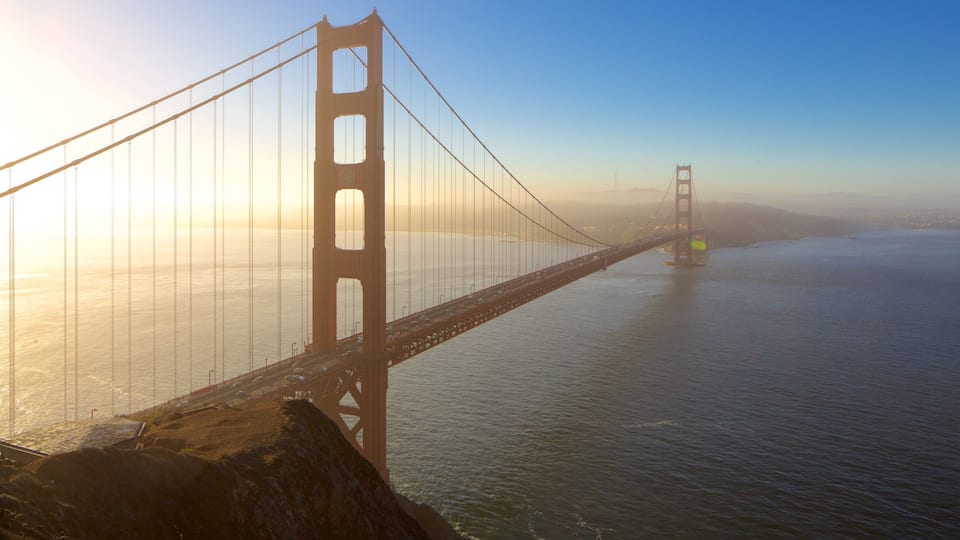 The Golden Gate Bridge with a clear view of the towers and cables, spanning across the water.