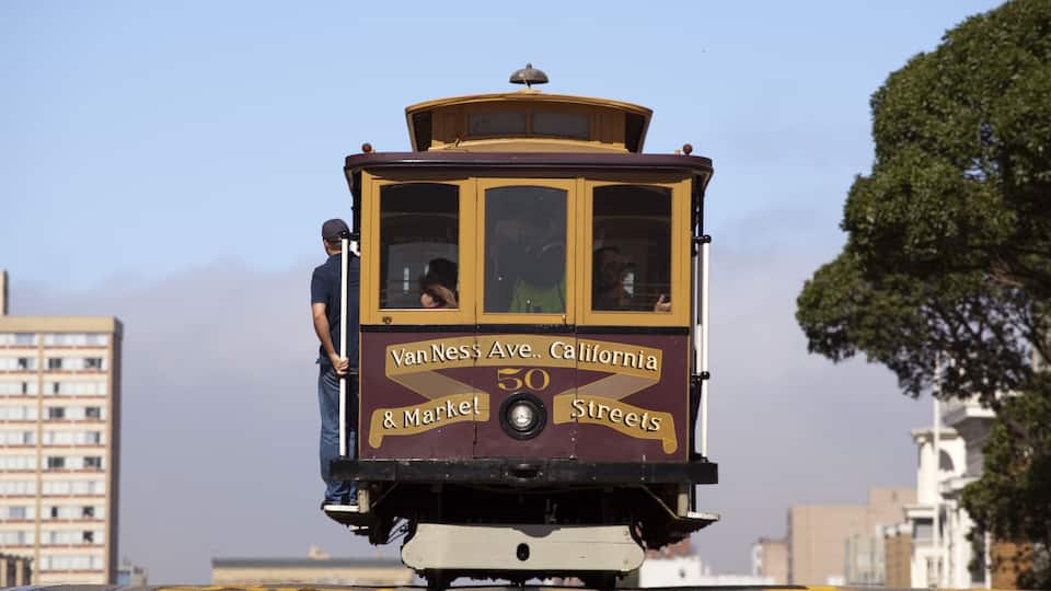 A vintage cable car on Van Ness Ave., California & Market Streets.