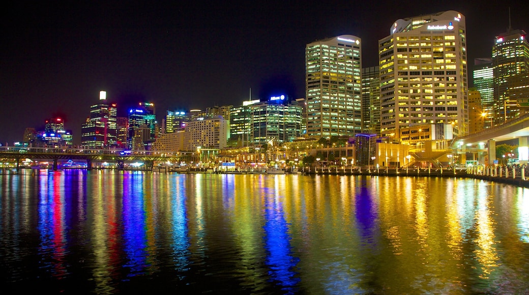 Sydney which includes night scenes, a bay or harbour and skyline