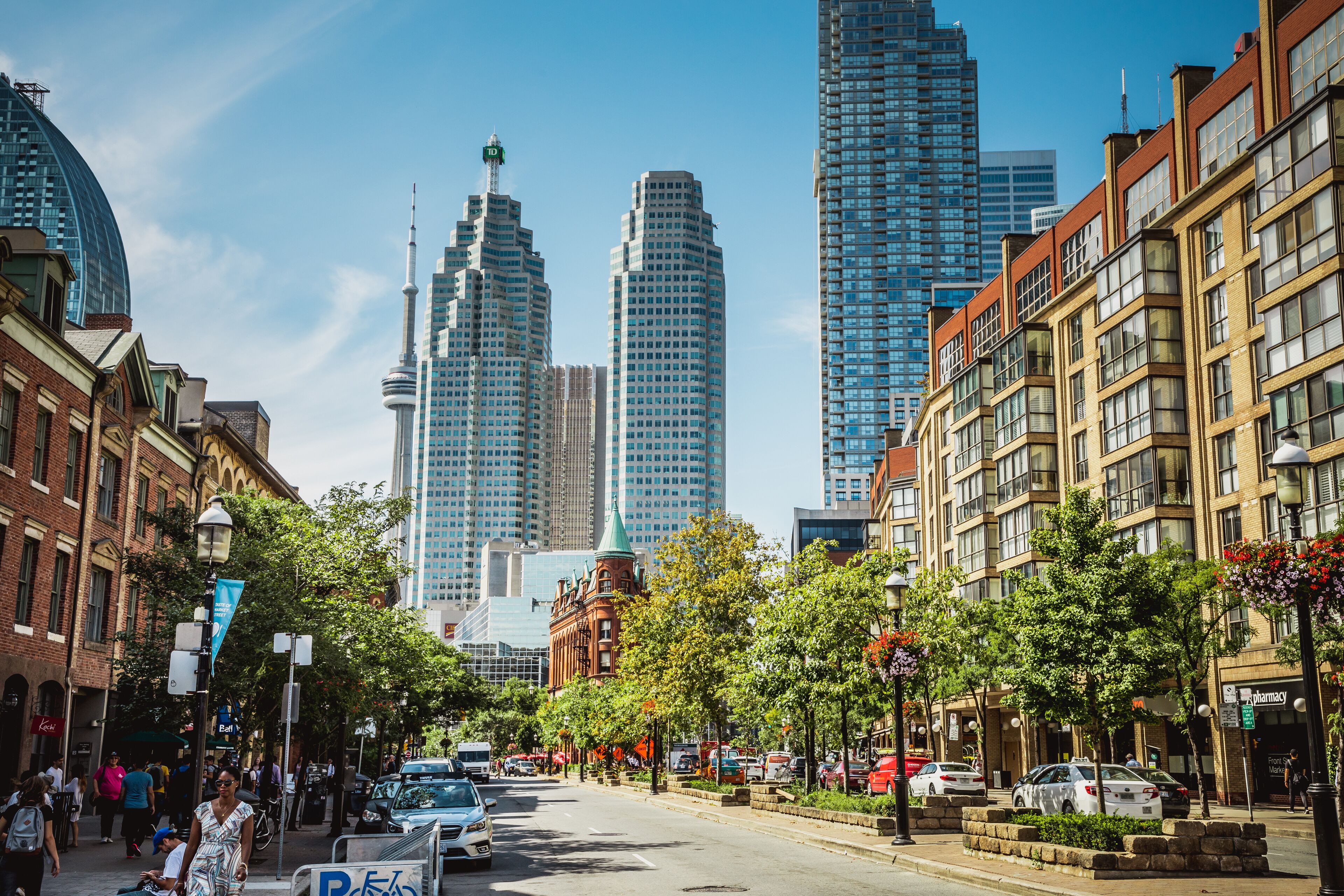 TORONTO, CANADA - SEPTEMBER 17, 2018: Rush hour atToronto's busiest intersections. Financial district at the background.