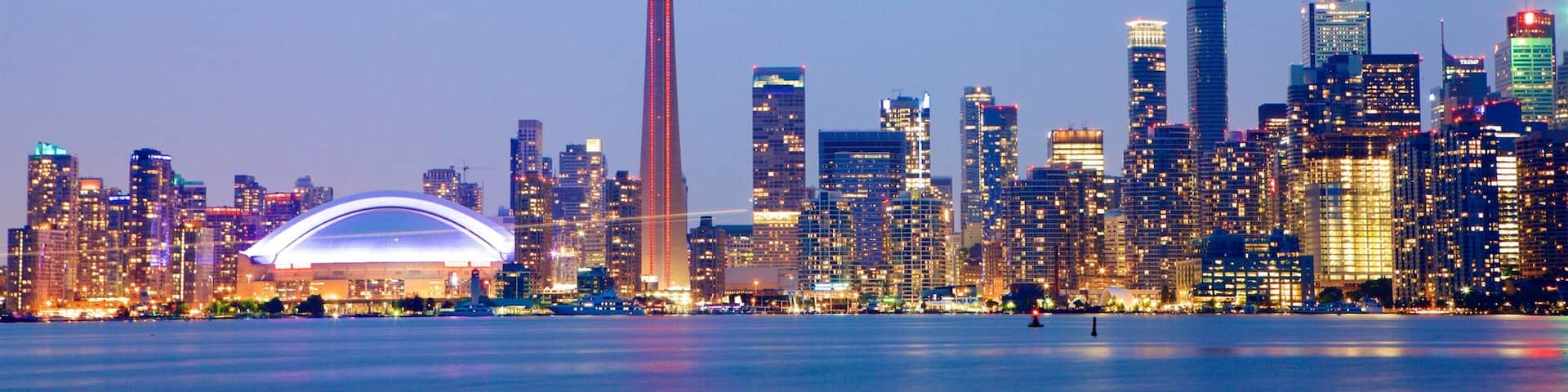 Toronto which includes a high rise building, a city and night scenes