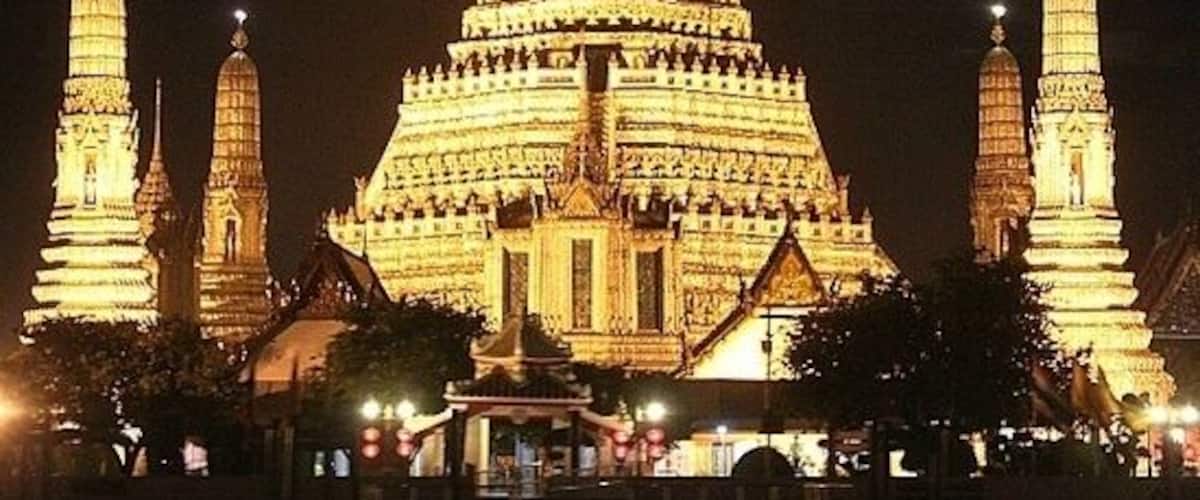 Wat Arun Temple is one of our favourite temples in Bangkok, Thailand. Located on the Thonburi west bank of the Chao Phraya River it's beautiful by day, or night.