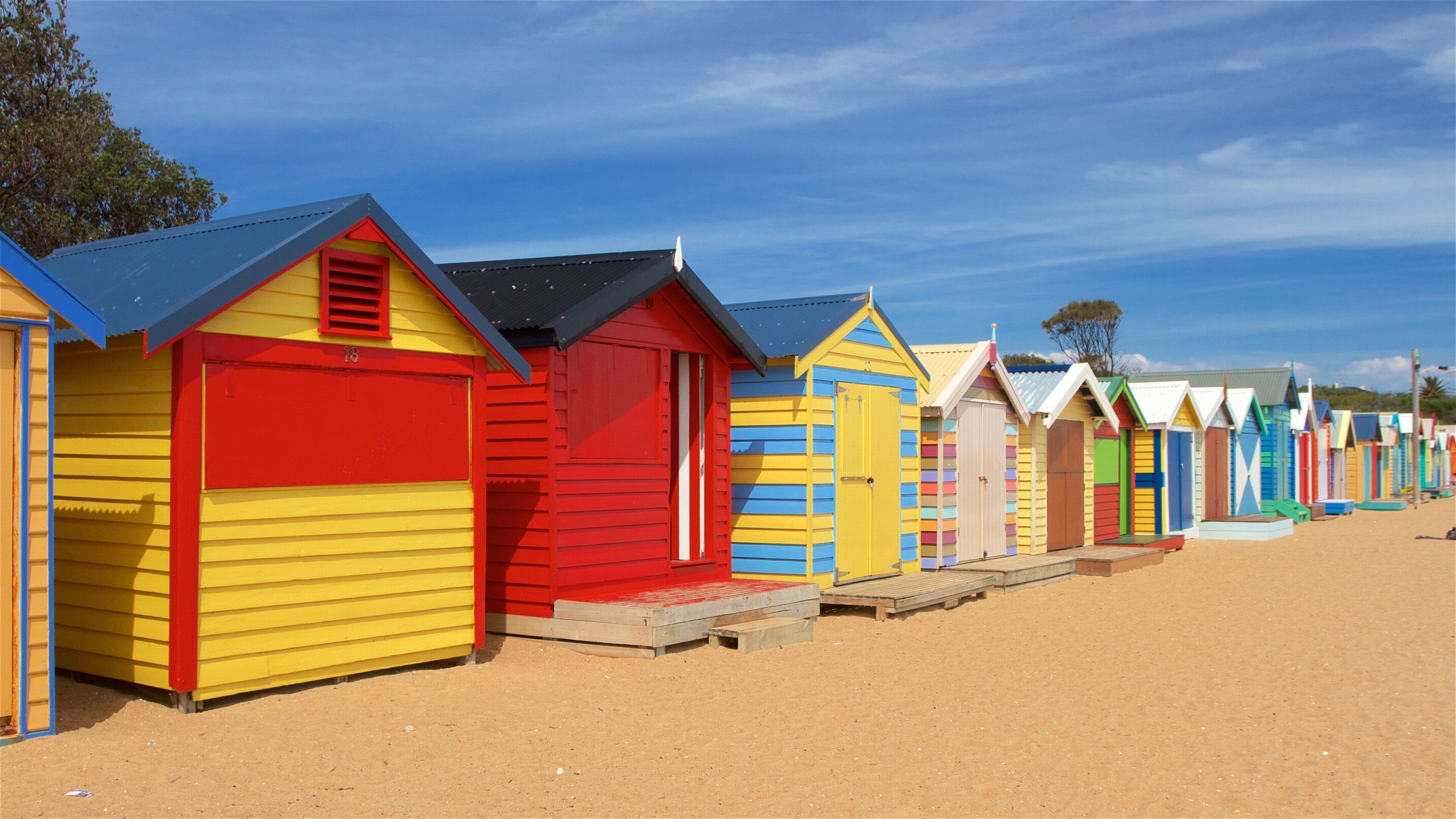 Brighton which includes general coastal views and a sandy beach