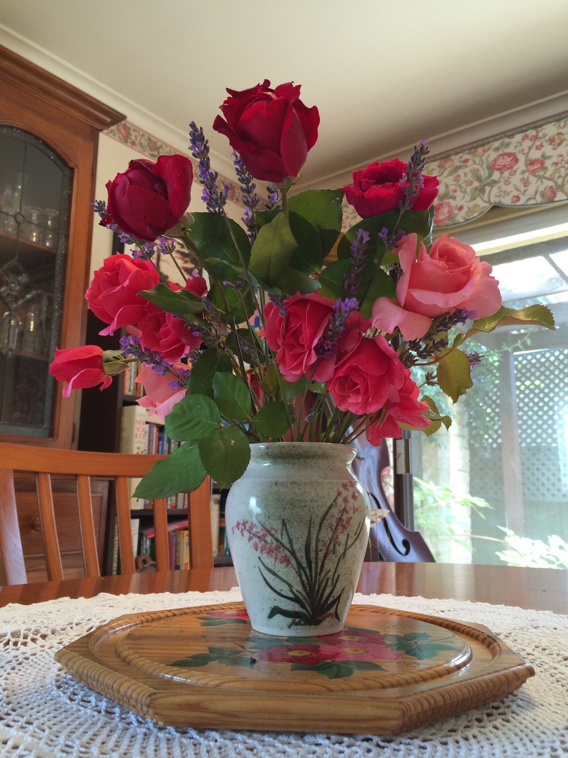 Travelled around my Summer garden on the last day of 2014 for these flowers - Roses and English Lavender in pottery vase.  
I also did some other work in the garden, including fixing the fountain in the fish pond and watering plants as it is mid Summer now and it's going to be really hot over the next few days!  
The wooden centre piece is from South Australia and I painted some 'Folk Art' style flowers on it back in 1993...