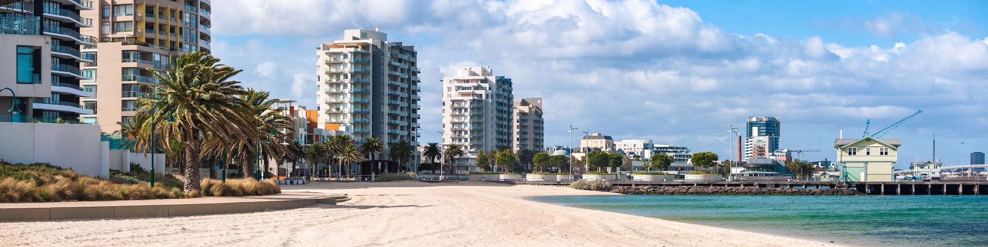 Beautiful panoramic view with residential apartment buildings and footpath along beach. Port Melbourne, VIC Australia., Shutterstock ID 1150810352, Purchase Order: -