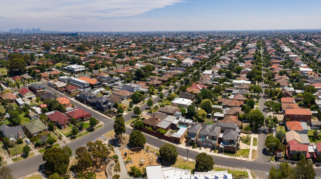 Panoramic aerial view of the suburb of Preston in Melbourne, with the city high rise buildings in the background.