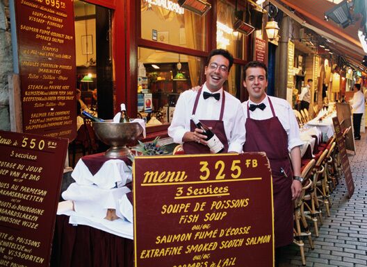 Belgiom, Brussels, waiters at restaurant, portrait (wide angle)
