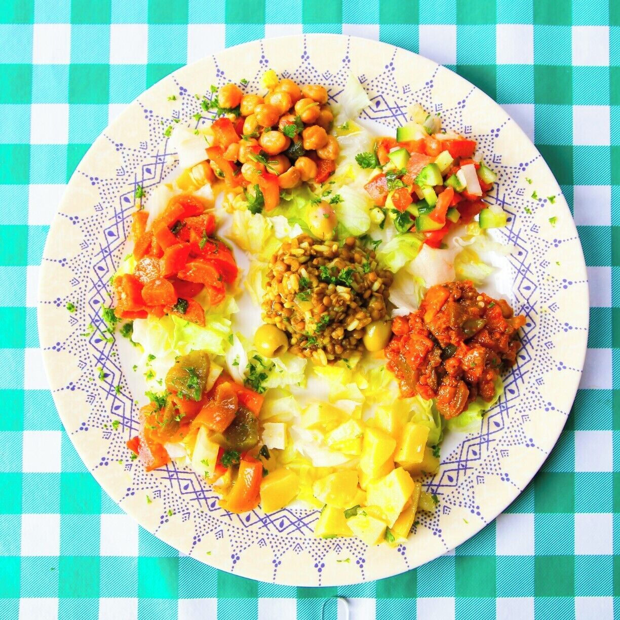A smattering of vegan Moroccan salads at Chez Mimoun in Brussels. Mimoun, the owner, and his buddy, Freddie, shared a beer with us and chatted for a while about everything from Belgium beer to their childhoods in Morocco and Algeria. They treated us like old friends.  
