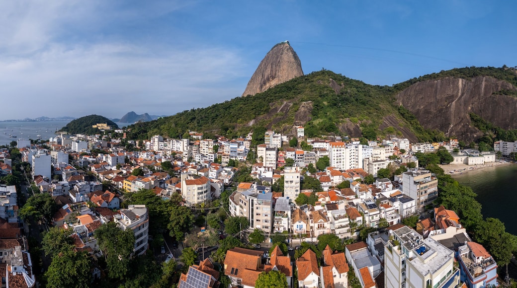 Aerial view of Sugarloaf Mountain and the Urca neighborhood with boats anchored in Guanabara Bay, Rio de Janeiro, State of Rio de Janeiro, Brazil.