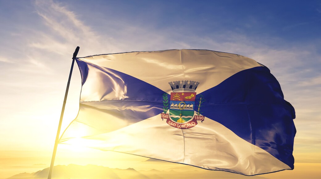 Sao Goncalo of Brazil flag waving on the top sunrise mist fog
