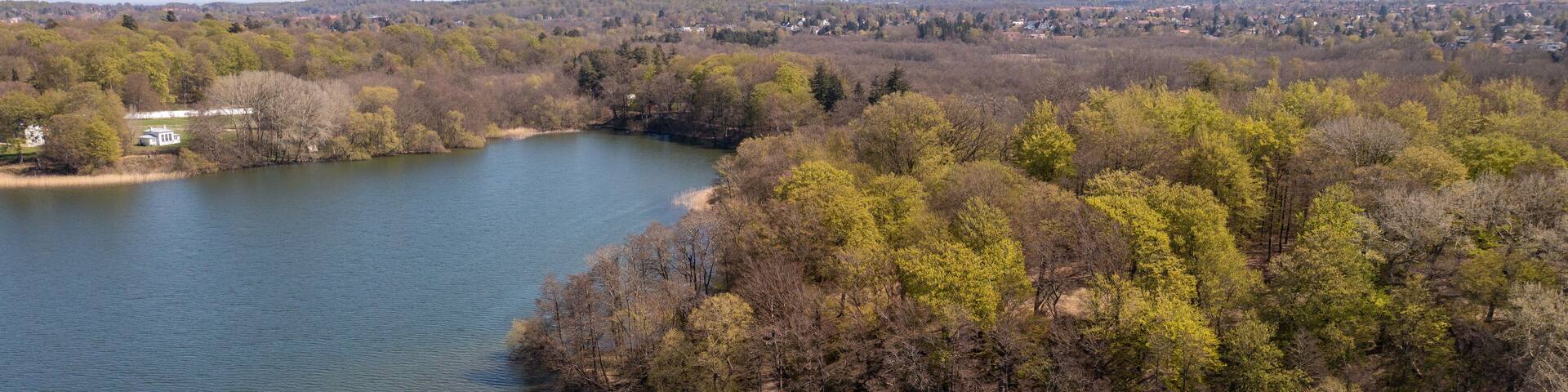 Farum, Denmark - April 20, 2022: Aerial drone view of Furesoe Lake in northeastern Zealand.