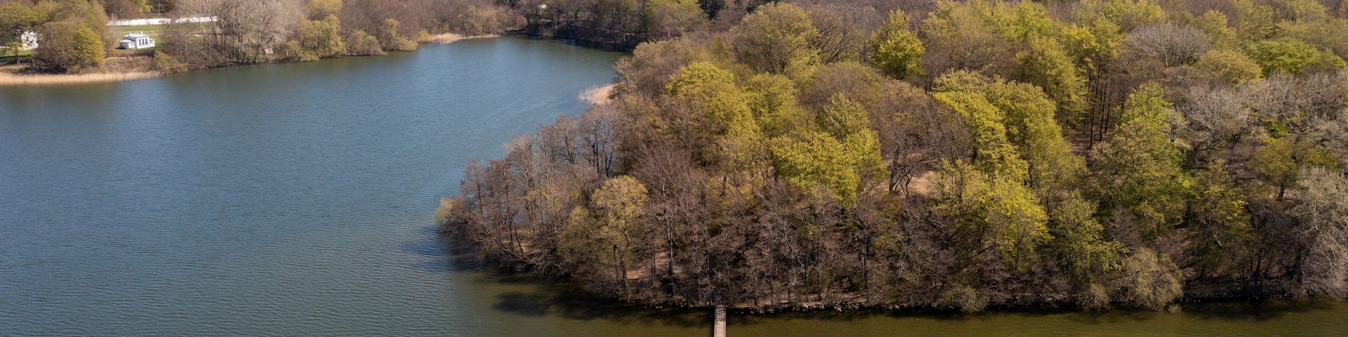 Farum, Denmark - April 20, 2022: Aerial drone view of Furesoe Lake in northeastern Zealand.