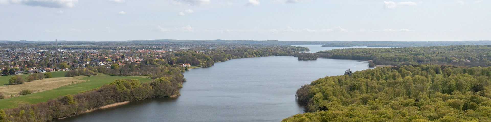 Farum, Denmark - May 04, 2022: Aerial drone view of Farum Lake in northeastern Zealand.