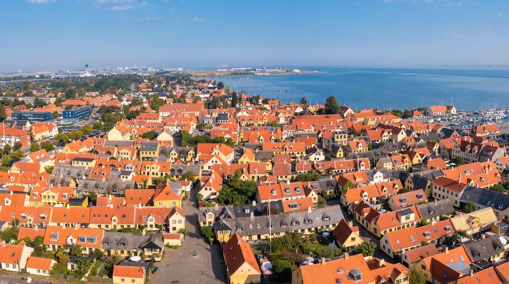Aerial view of the beautiful, small, yellow rustic houses. Traditional Scandinavian style. Fishing village Sights Travels