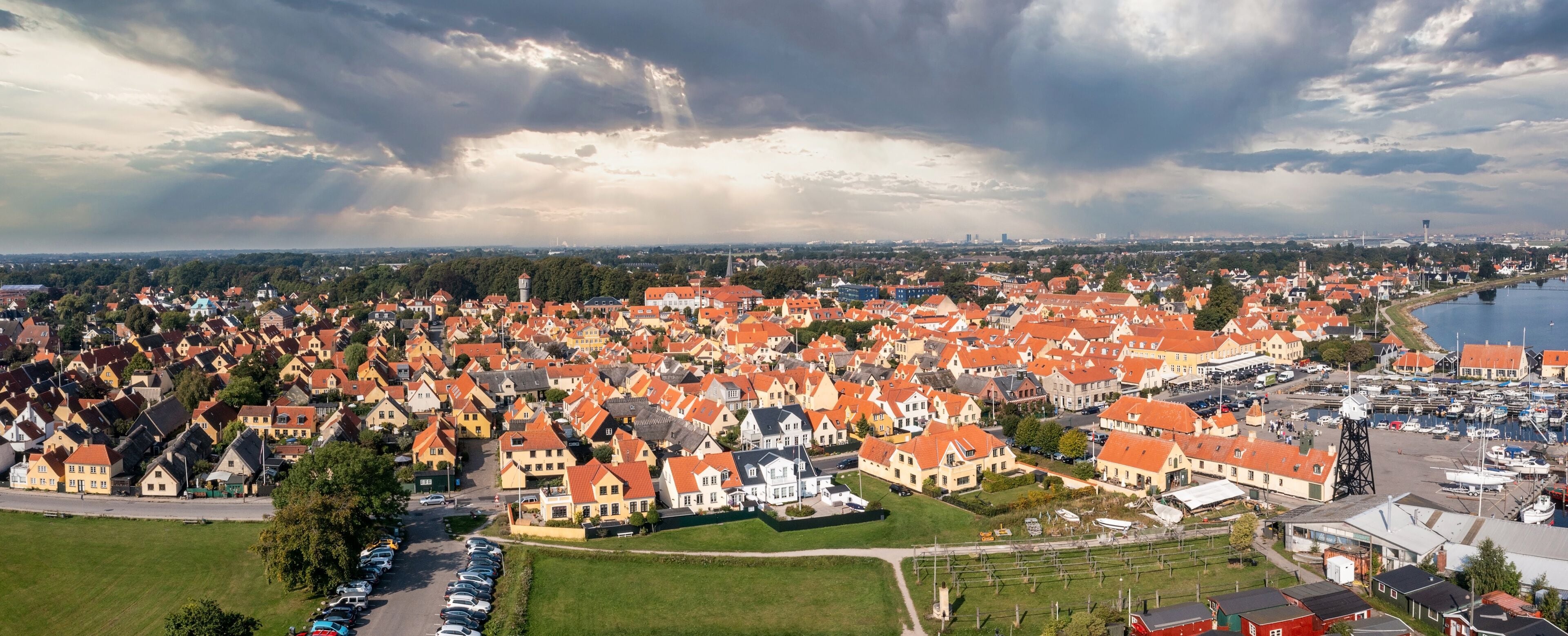 Aerial view of the beautiful, small, yellow rustic houses. Traditional Scandinavian style. Fishing village Sights Travels