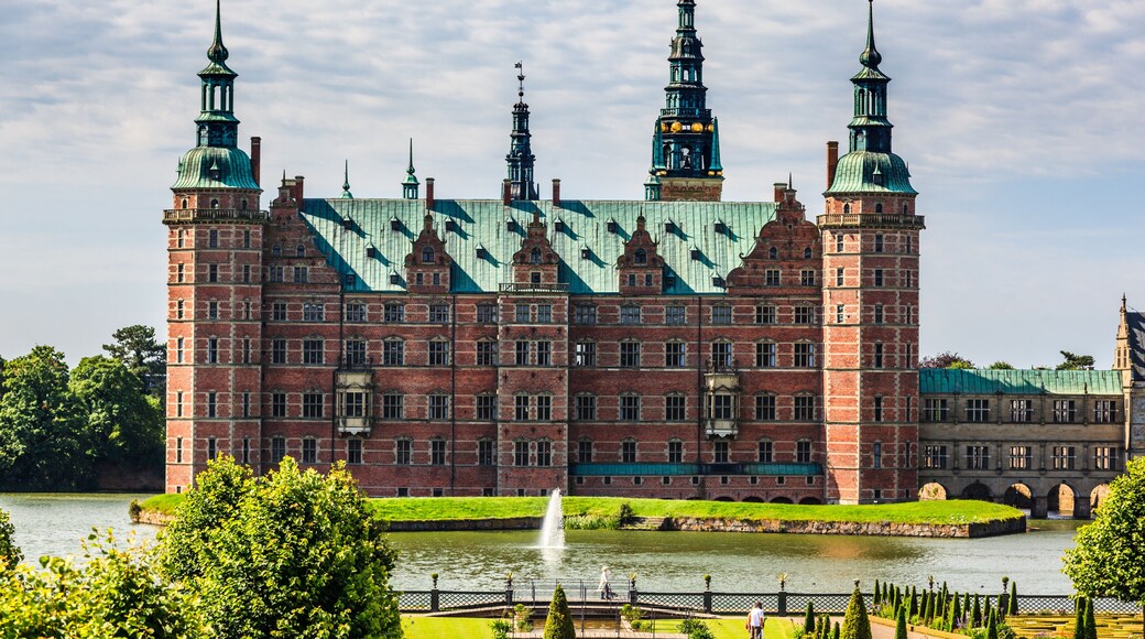 The majestic castle Frederiksborg Castle seen from the beautiful park area,