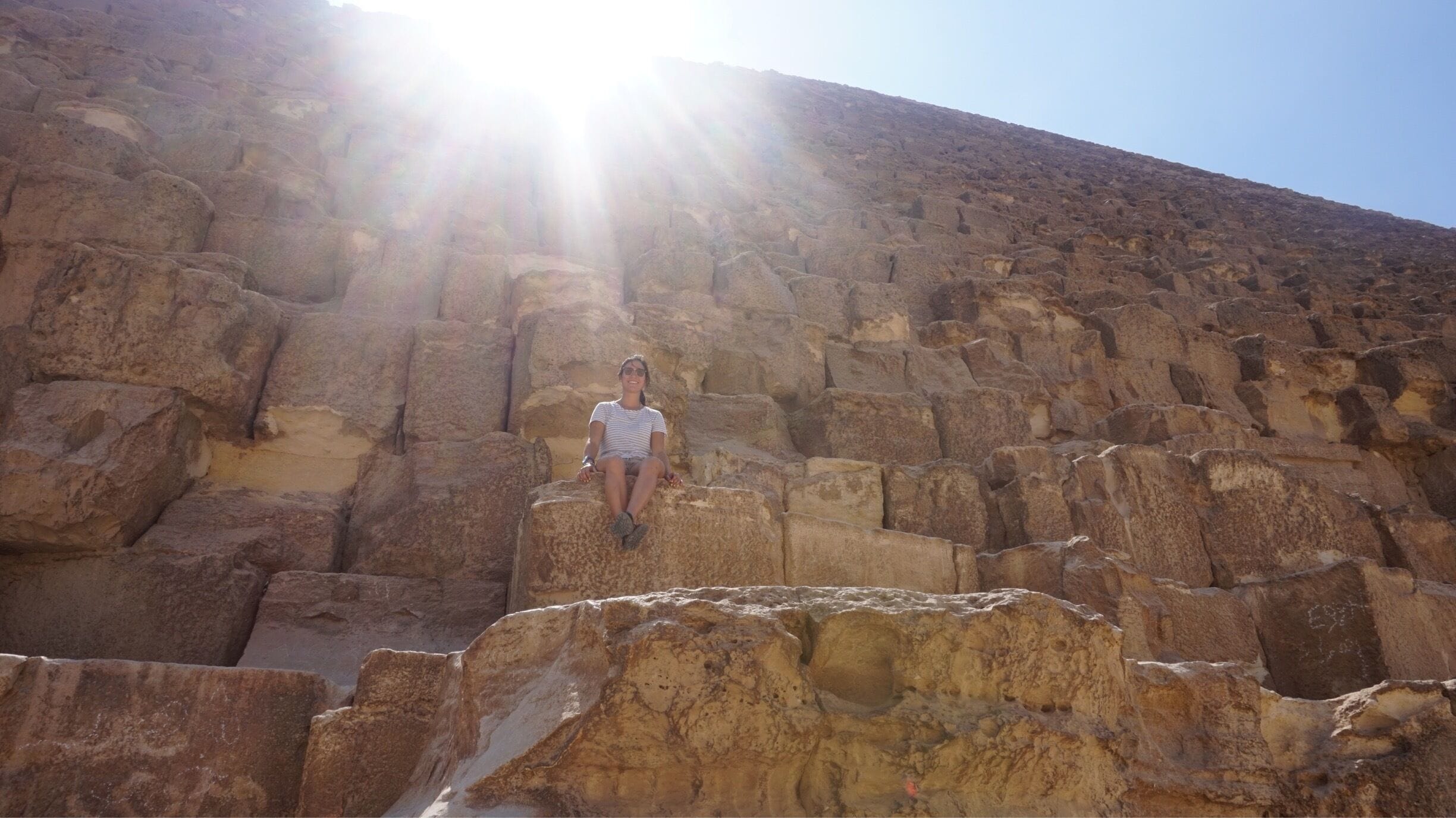 Climbing to the top, Giza pyramids, Egypt.