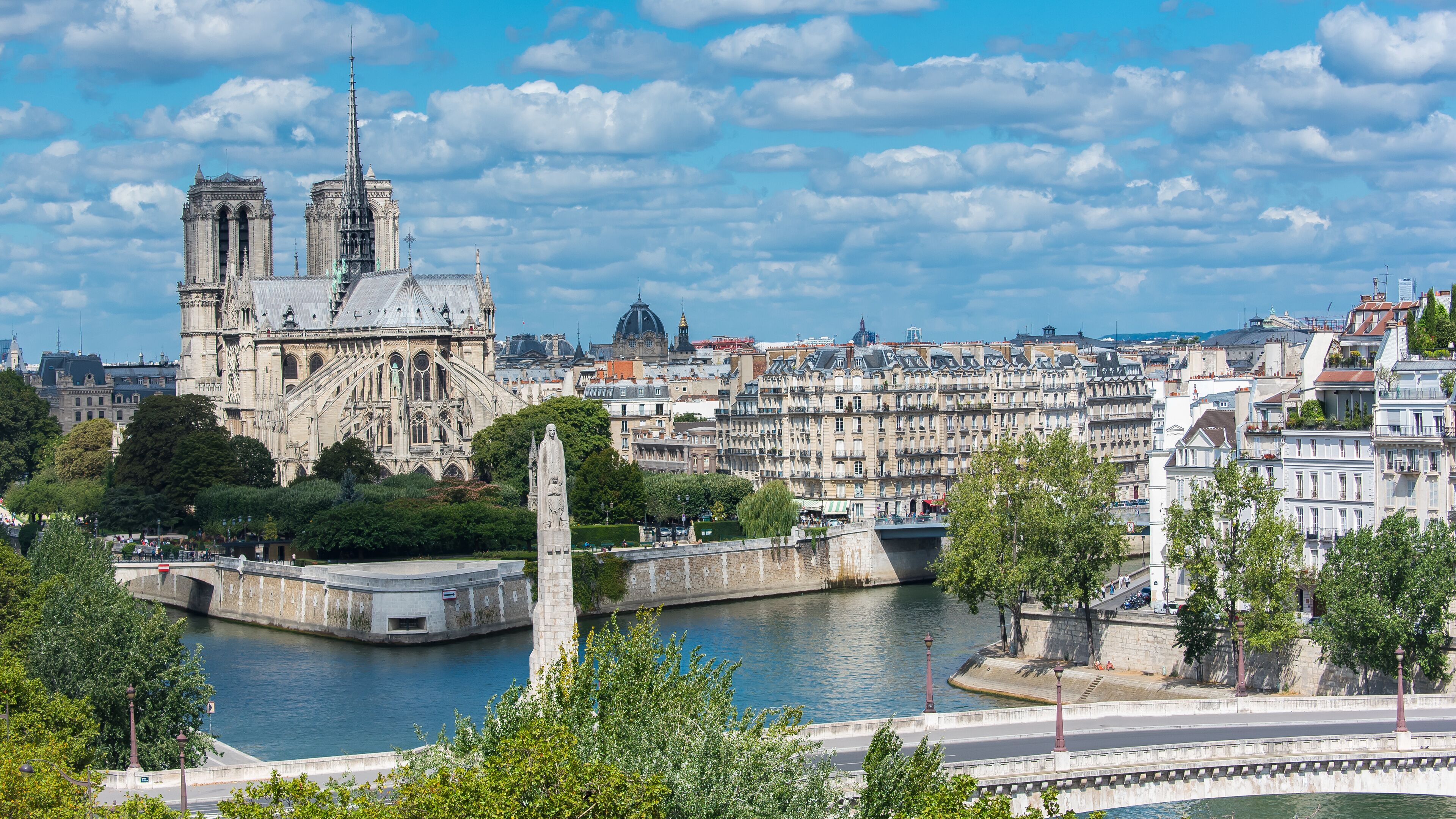     Paris, panorama of Notre-Dame cathedral and the Tournelle bridge in the center, ile de la Cite and ile Saint-Louis
