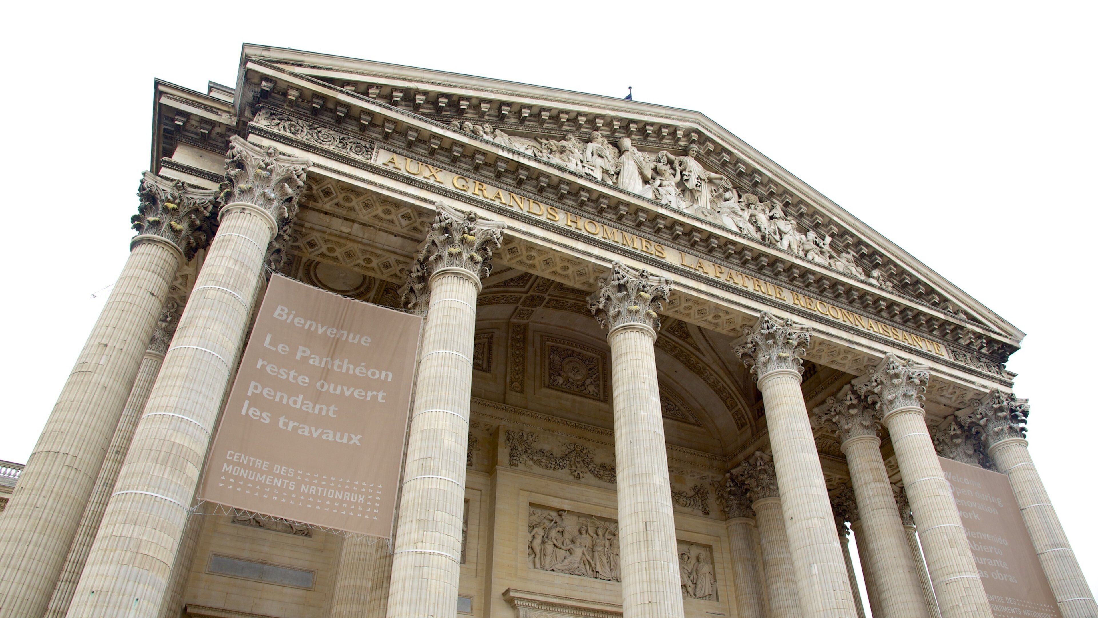 The facade of the Grand Palais with columns and sculptures.