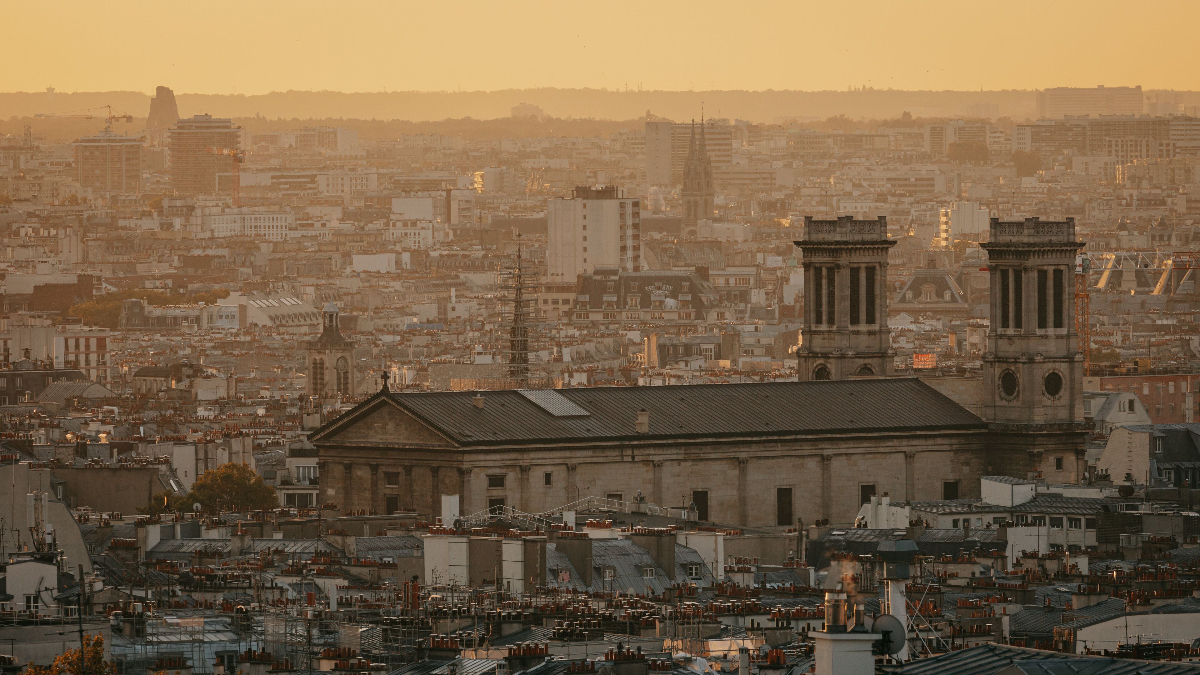 Montmartre which includes landscape views, a sunset and a city
