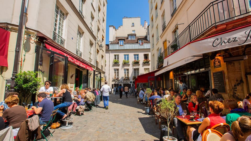 Marais which includes street scenes and outdoor eating as well as a small group of people