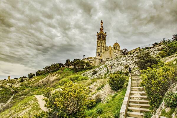 Take the steep steps from the bus stop for this view of Marseilles famous landmark. #History