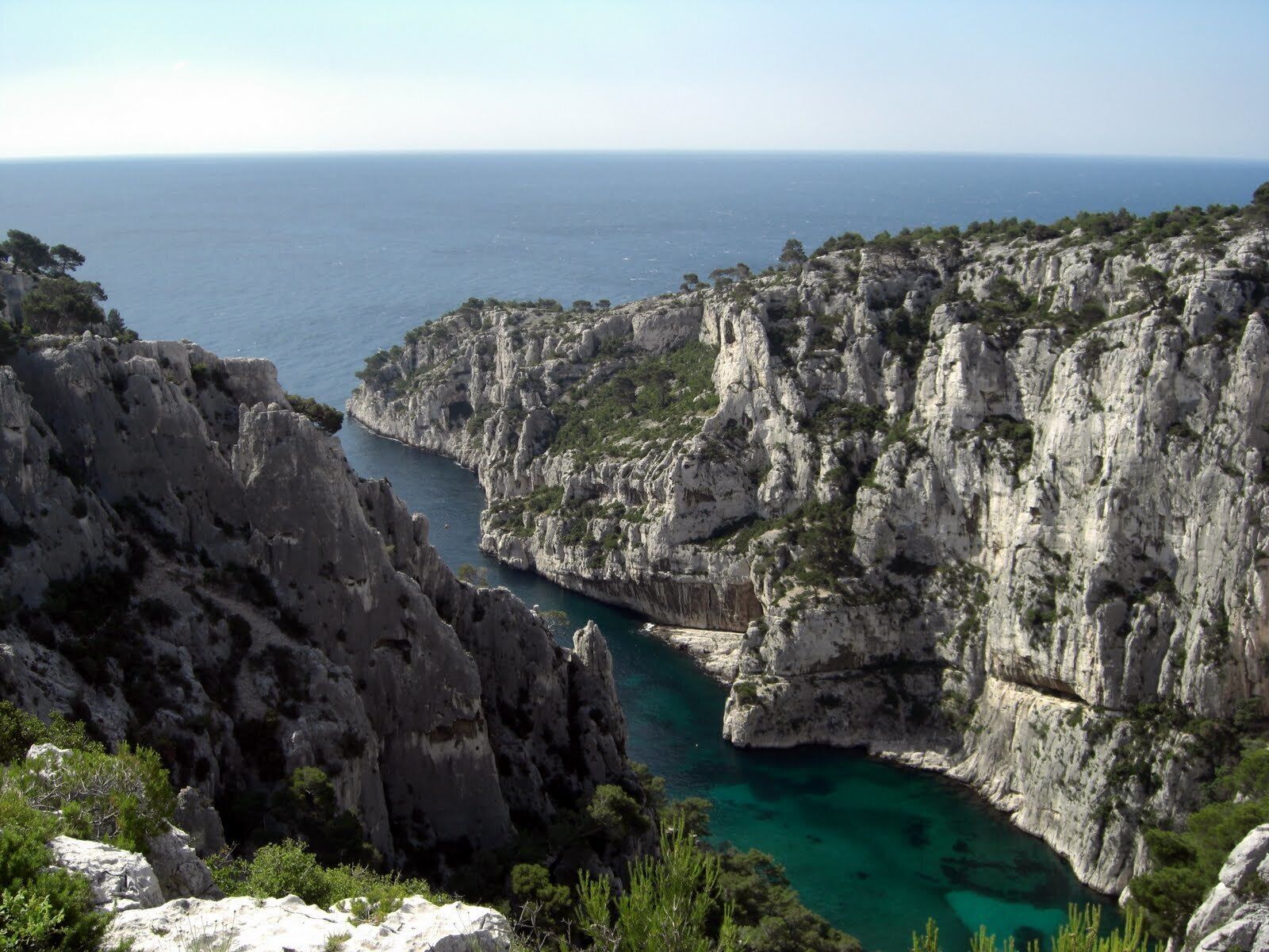 A callanque is a unique landscape: a small sand beach surrounded by giant cliffs. Most are not accessible by cars or motorbike so you have to walk to access such places.