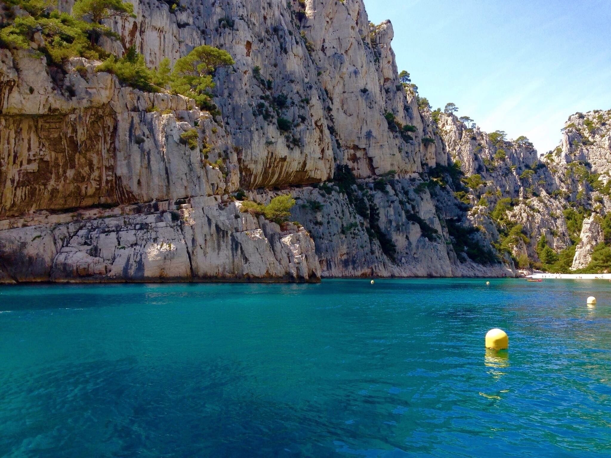 Now this is one of the best days we've ever had in France (and there's been a lot).  The water is as clear as can be.  You can go by foot but it's busy.  Best idea is to take a boat over (which you can rent in Cassis) or hire someone to take you but you must spend the day swimming.  Last idea is a kayak.  Many people doing that too.  It's so beautiful.  Don't miss it!