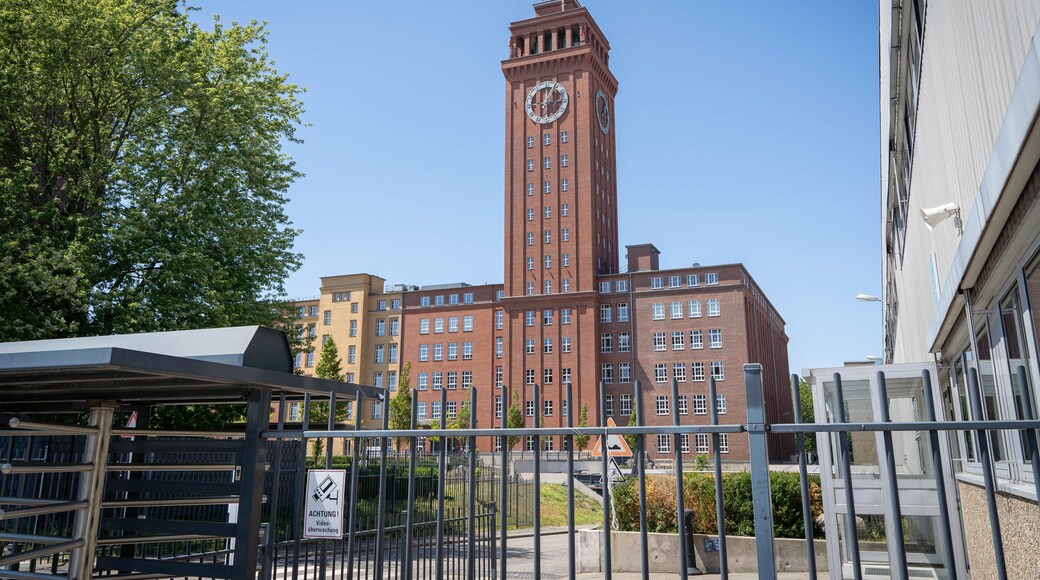 Famous clock-tower in Siemensstadt, a district of Berlin, Sign says "ATTENTION! Video surveillance" in German