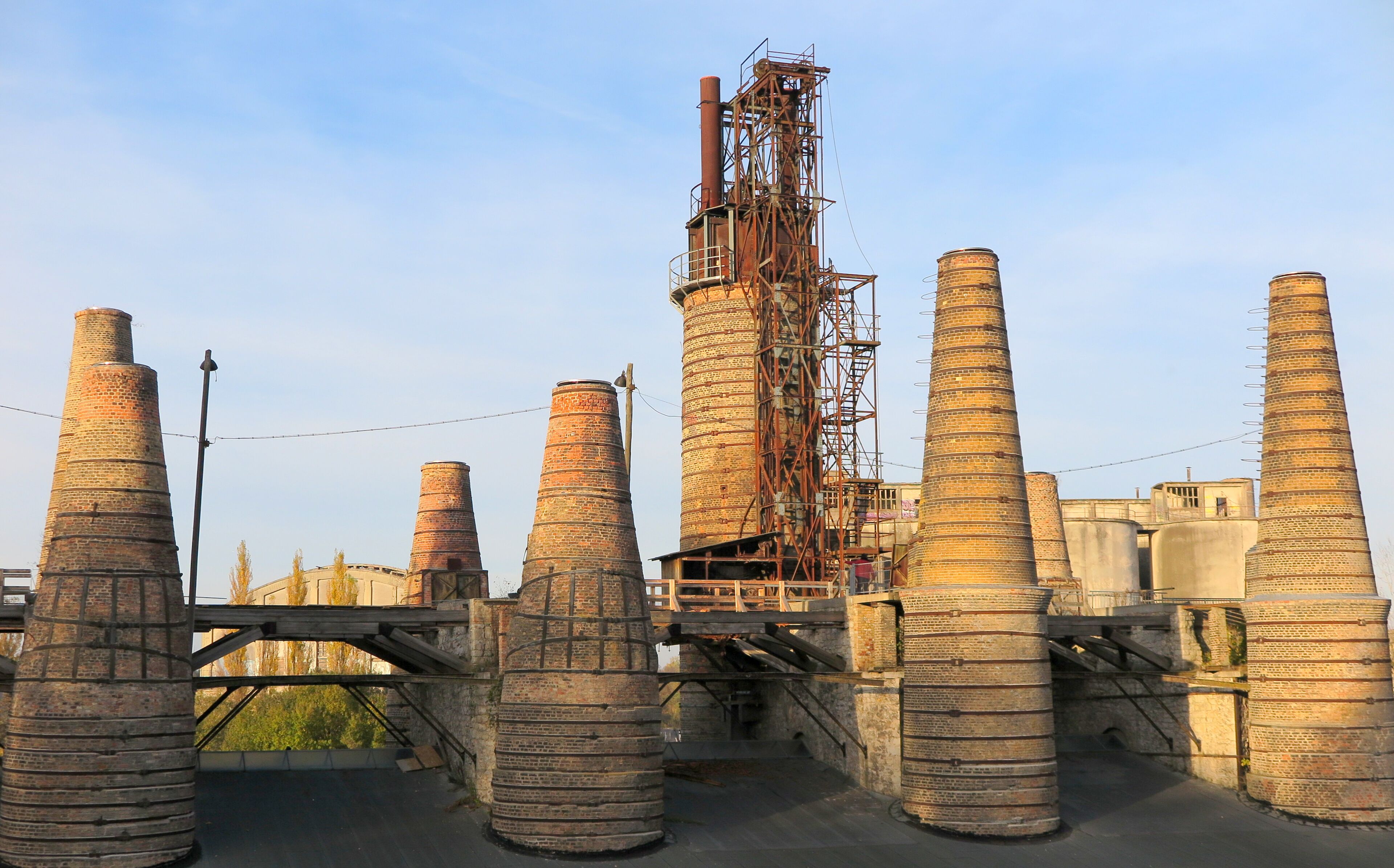 Industrial chimneys and a metal structure.