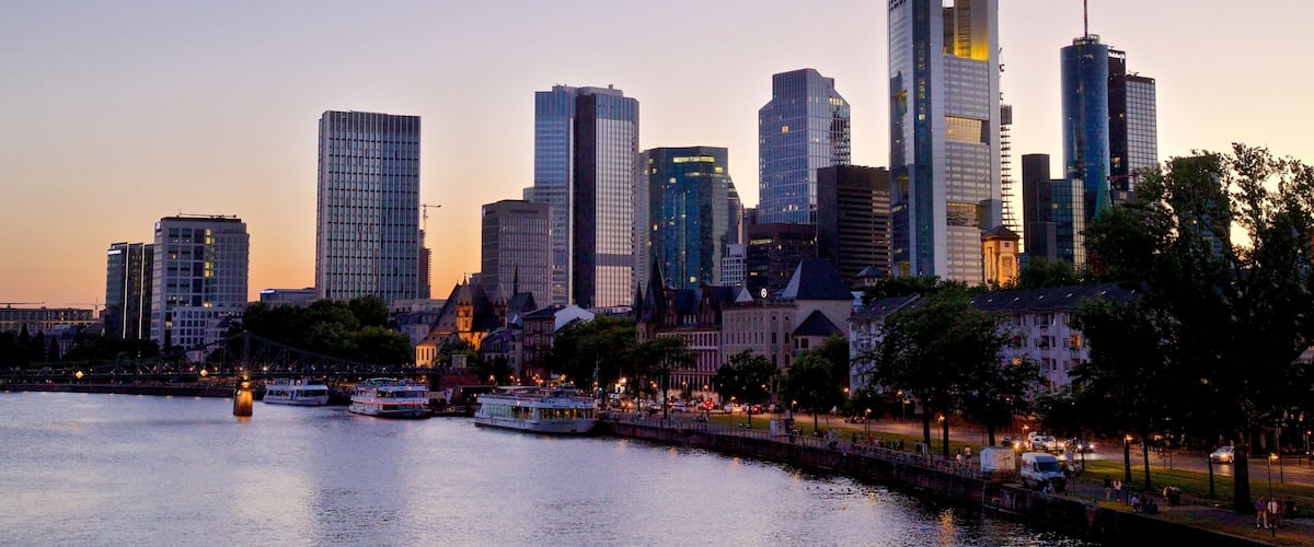 Niederrad featuring a city, a river or creek and a sunset