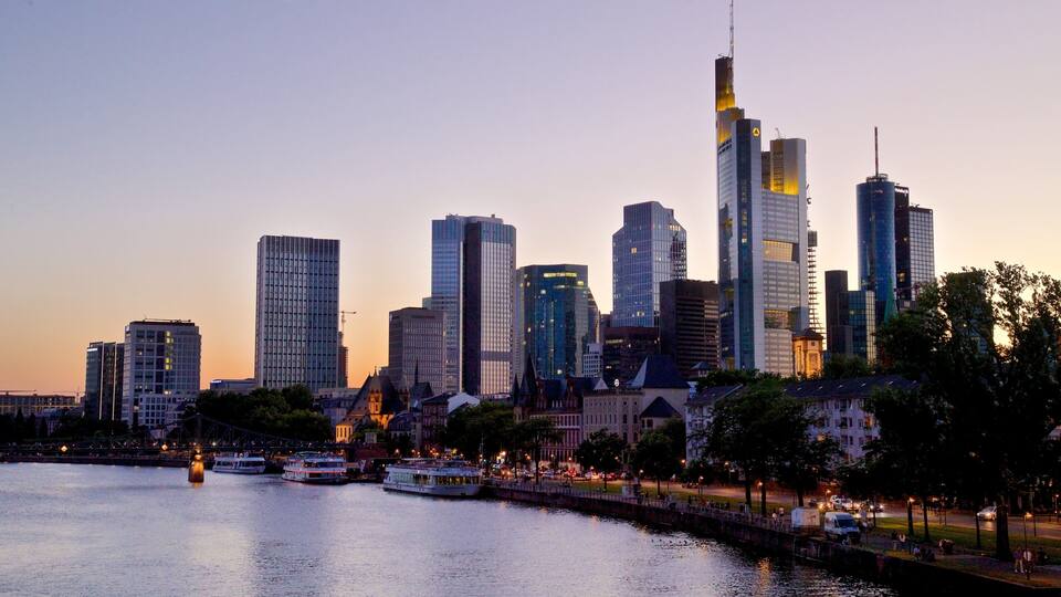 Niederrad featuring a city, a river or creek and a sunset