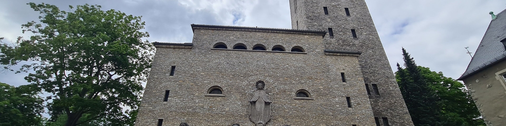 catholic church with atmospheric sky in Berlin Karlshorst